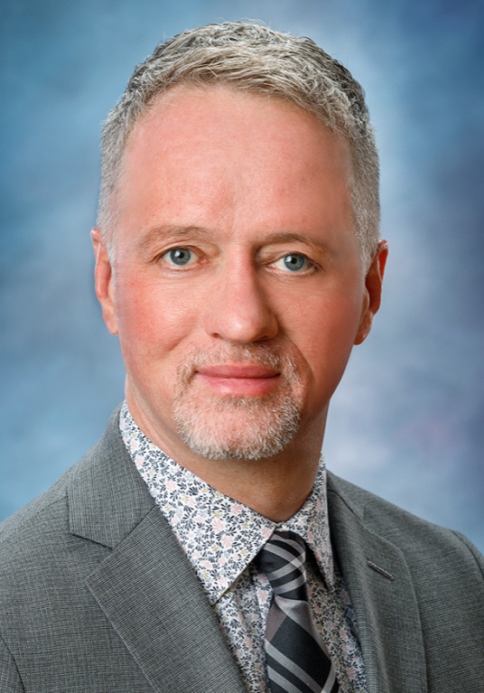 President: Chris Spradlin, MA